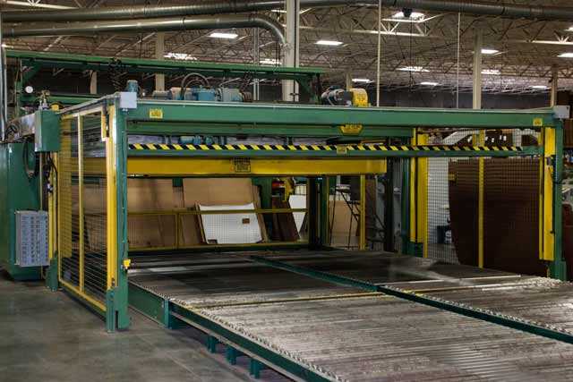 Jumbo flexo machine in warehouse facility